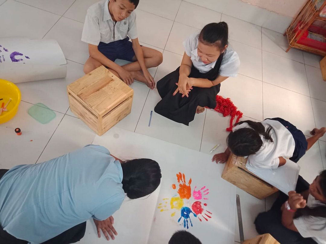 partner program NGO rabbit school child education draw cambodia